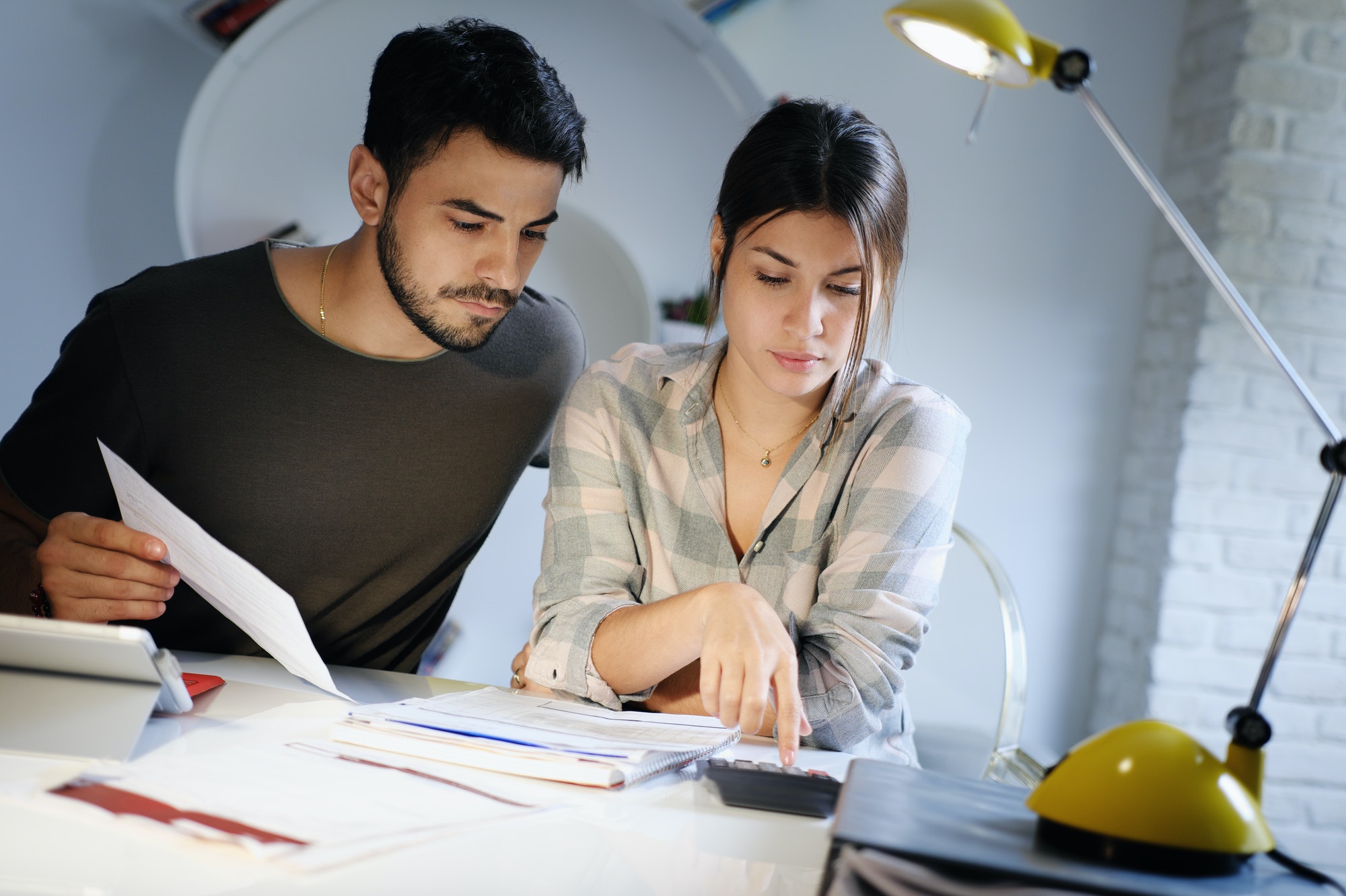 Man and Woman Worried For Taxes And Family Budget